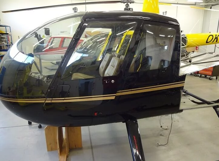 Den pilotem a mechanikem R44 
