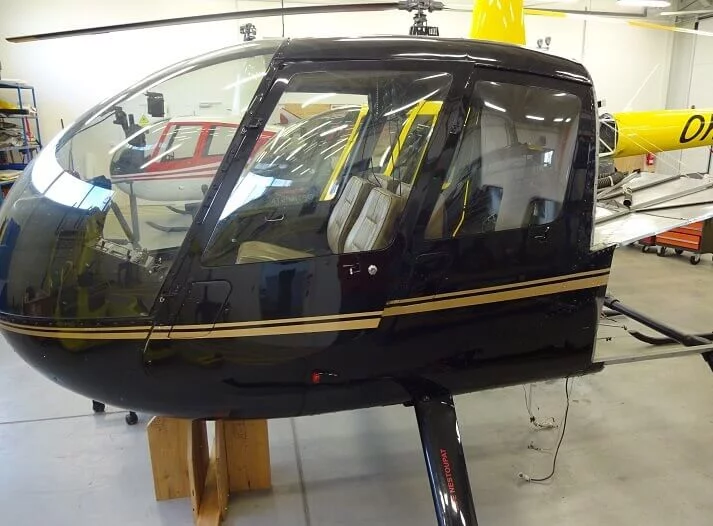 Den pilotem a mechanikem R44 